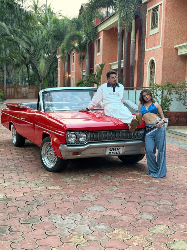 Fashion shoot with the red finned convertible